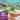 Child cutting vegetables and scrubbing a potato, with the text Healthy veggies made fun